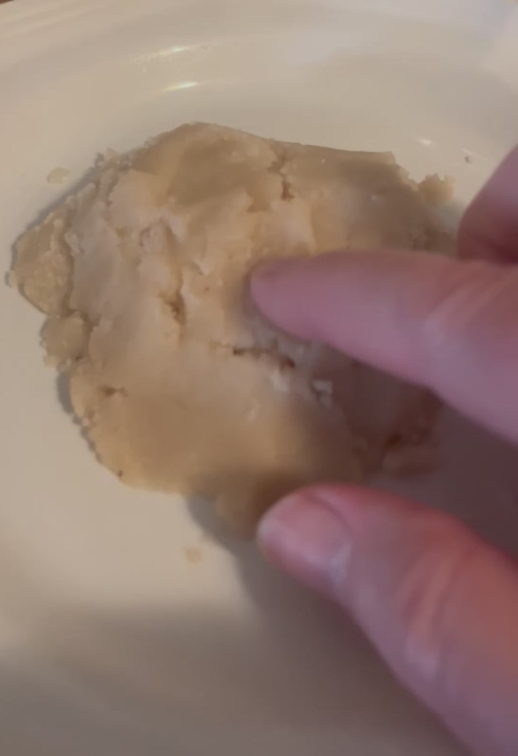 Hand demo of the Coffee and Rose Hip Oil Facial Scrub