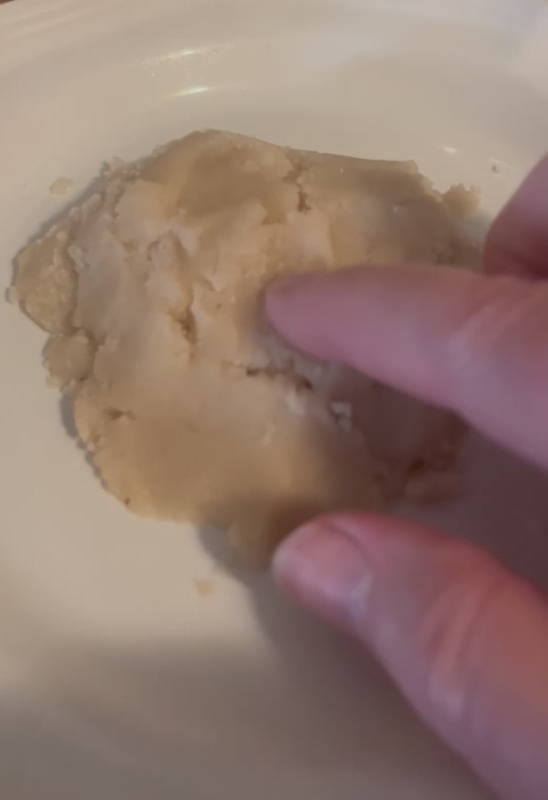 Hand demo of the Coffee and Rose Hip Oil Facial Scrub
